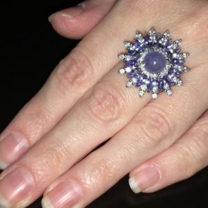 Серебряное кольцо Цветок с танзанитами