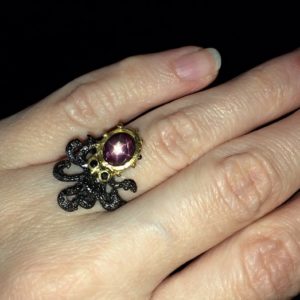 Серебряное кольцо Осьминог со звёздчатым рубином