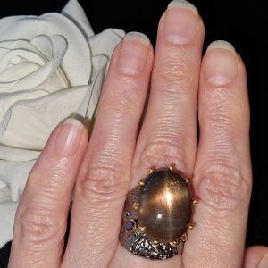 Кольцо серебро природный солнечный камень кошачий глаз