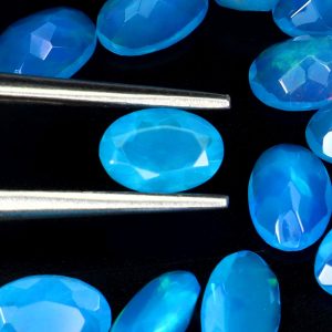 Натуральные гранёные голубые опалы 15 шт. по 6х4 мм